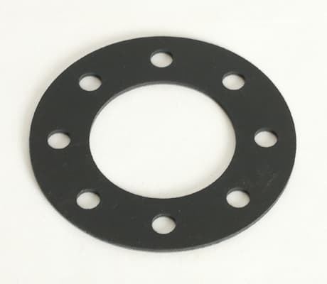 ボルト穴がある円形ゴムパッキン。フランジ用の加工サンプル。